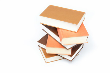 A stack of books on a white background.