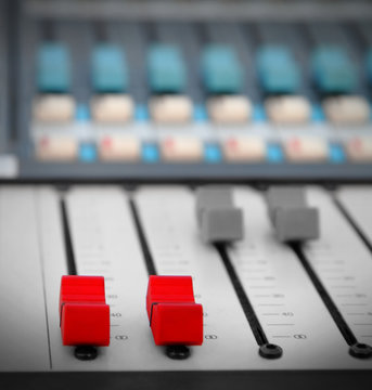 Close Up Of Red Audio Sound Mixer With Buttons