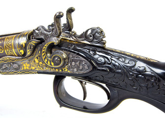old double-barrelled hunting gun 12 caliber isolated on white