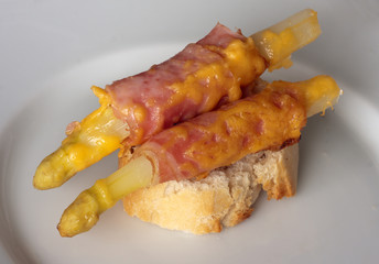 asparagus and ham with cheddar on a baguette