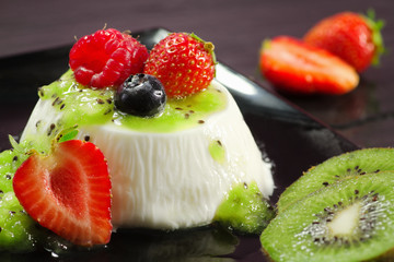 panna cotta with kiwi cream and berries