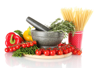 spaghetti in cup, rosemary in mortar, and vegetables