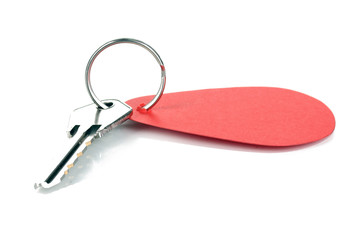 Key with charm isolated on white