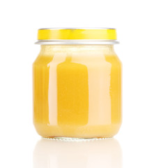 Jar of baby puree isolated on white