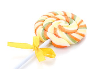 Colorful lollipop with bow isolated on white