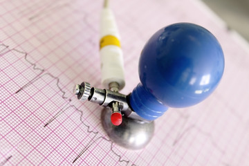 ECG electrode on fragment of electrocardiogram