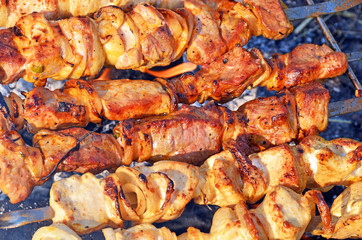 shish kebab on skewers and hot coals