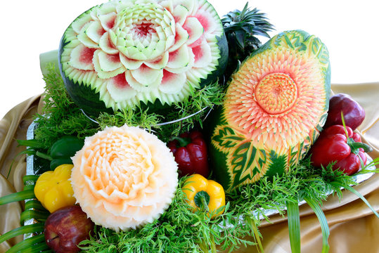 MIxed Fruit carvings is isolated on white