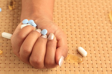 Pill in hand