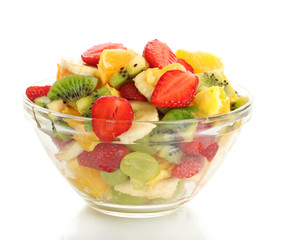 glass bowl with fresh fruits salad isolated on white