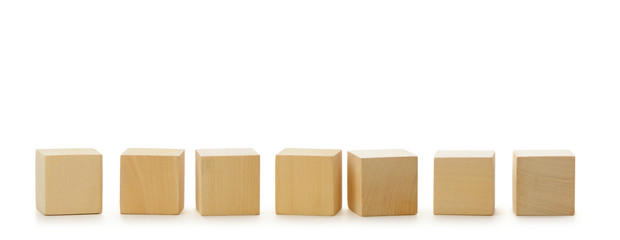Wooden cubes in row