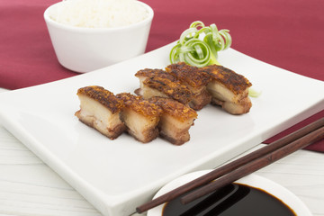 Siu Yuk - Chinese crispy roasted pork belly, rice & dip.