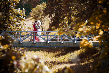 Bride and groom on the bridge