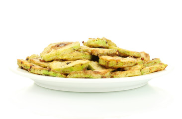 Fried zucchini in a white plate isolated on white