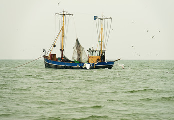 Trawler fishing in a lake