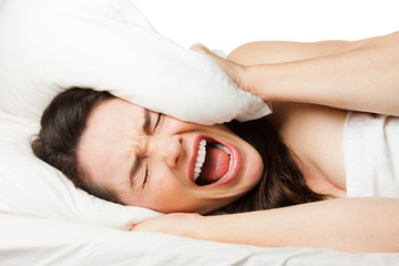 Frustrated woman trying to sleep