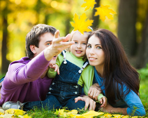 Happy family in autumn