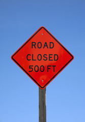 Road closed five hundred feet sign