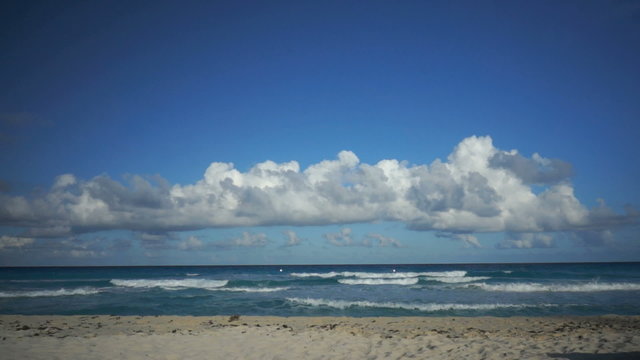 Blue cloudy sky beach