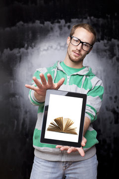 Digital library - Good Looking Smart Nerd Man With Tablet Comput