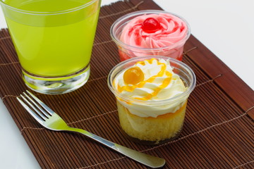 Cup cakes and drinks.