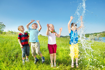 Kids enjoying water splashes - 42018261