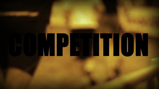 Competition Schriftzug mit L&auml;ufern im Hintergrund