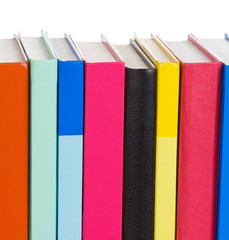 pile of new books isolated on white