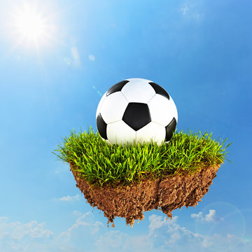 soccer ball on a piece of sod