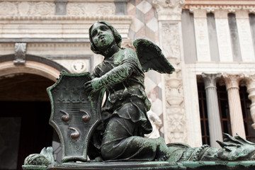 angel on the fence of Bergamo cathedral