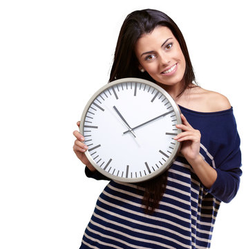 portrait of young woman holding clock against a white background