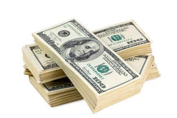 pack of us currencys on a white background