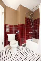 Classic antique brown and red bathroom.