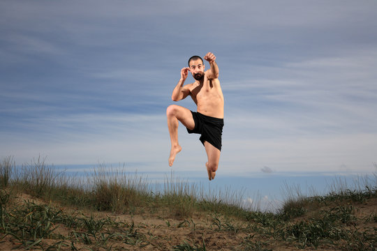 martial arts instructor jumping