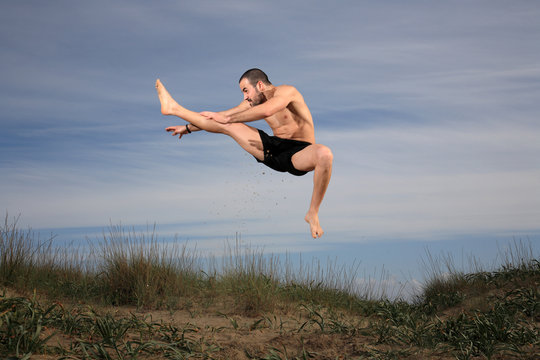 martial arts instructor jumping
