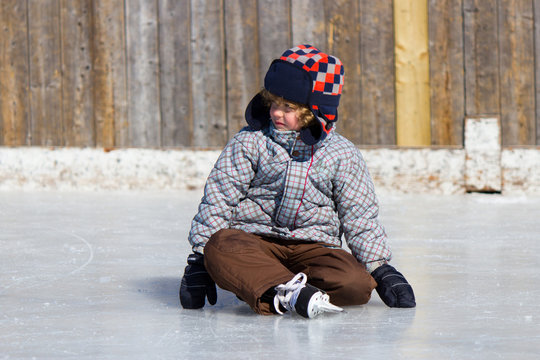 Boy Learning To Ice Skate