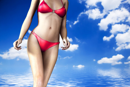 Sexy woman body in bikini in hot summer