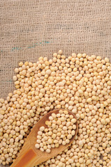 soy beans and spoon on sack