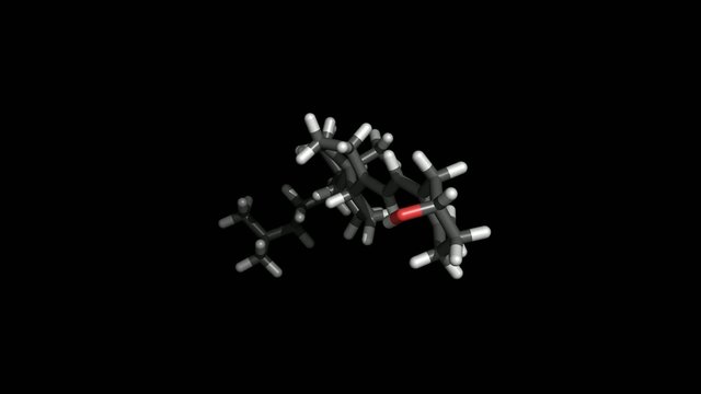 Vitamin D molecule in a stick representation on black background