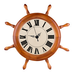 A photo of a captains wheel clock