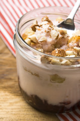 Sweet dessert in glass jar - strawberry cake