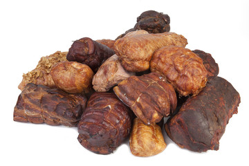 Pile of smoked meat products