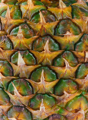 Fototapeta premium Close up texture of fresh ripe pineapple background