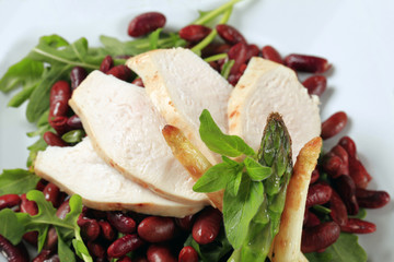 Chicken breast with red beans and arugula