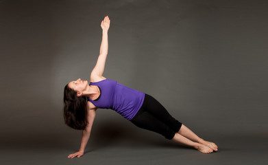 Fototapeta na wymiar Fit woman doing yoga