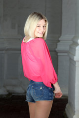 Naklejka premium Beautiful young woman. Outdoor portrait