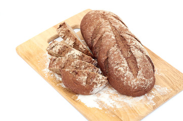 Fresh bread with ear of wheat isolated on white
