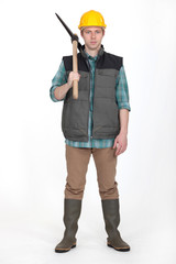 A man with a pickaxe.