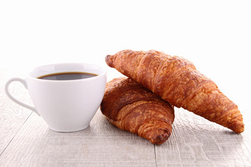 coffee cup and croissant