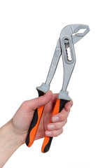 Hand holding an adjustable wrench
